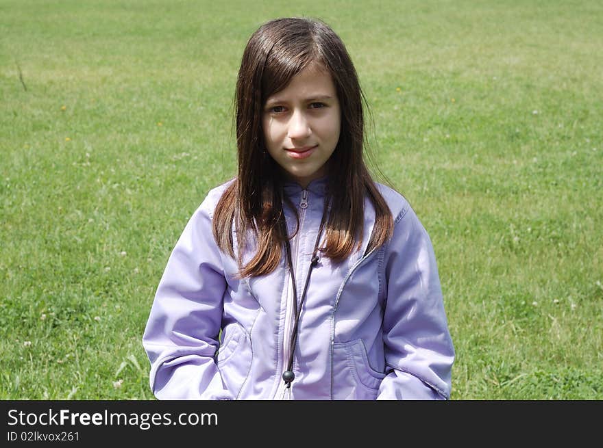 Girl Resting In Grass