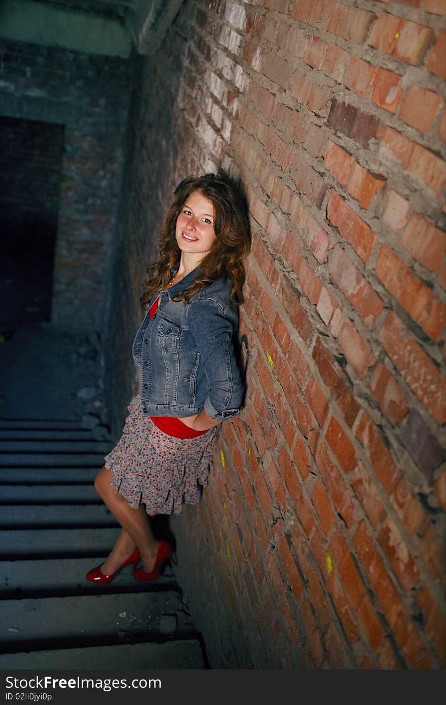 Smiling girl on the staircase