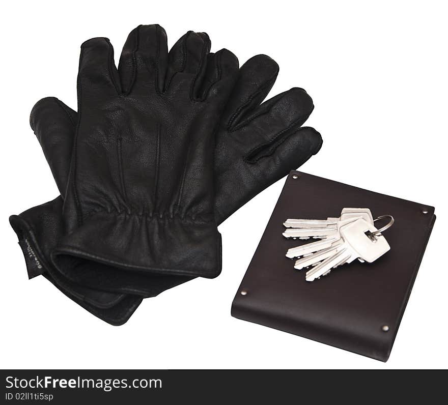 Black man's gloves with purse and keys. Black man's gloves with purse and keys