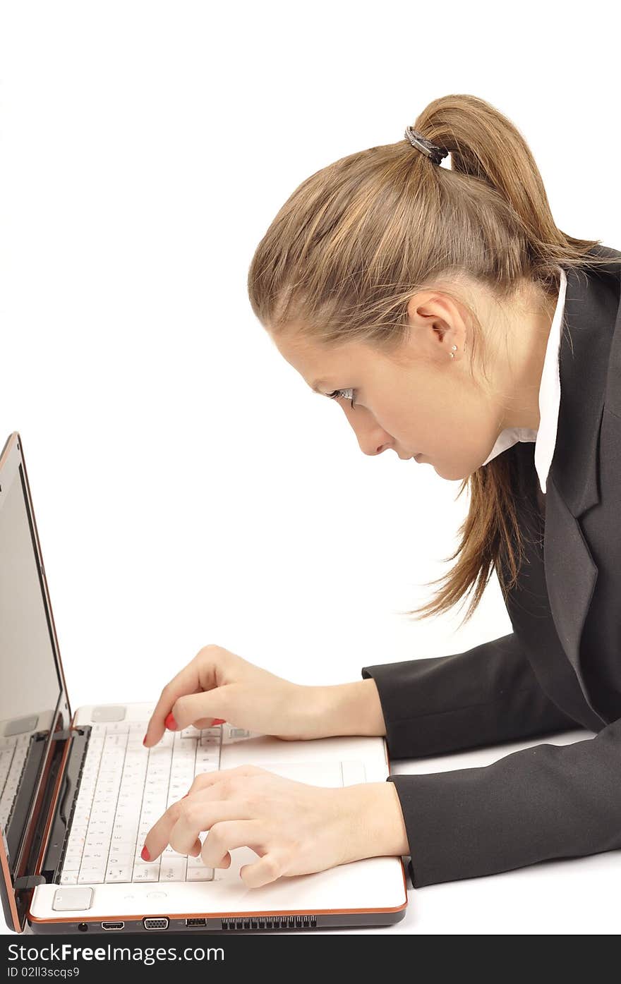 Young businesswoman is working using notebook computer. Young businesswoman is working using notebook computer