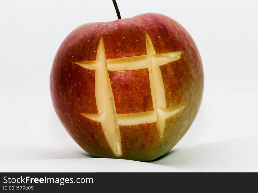 Apple on which the lattice is cut out from several rods. Apple on which the lattice is cut out from several rods