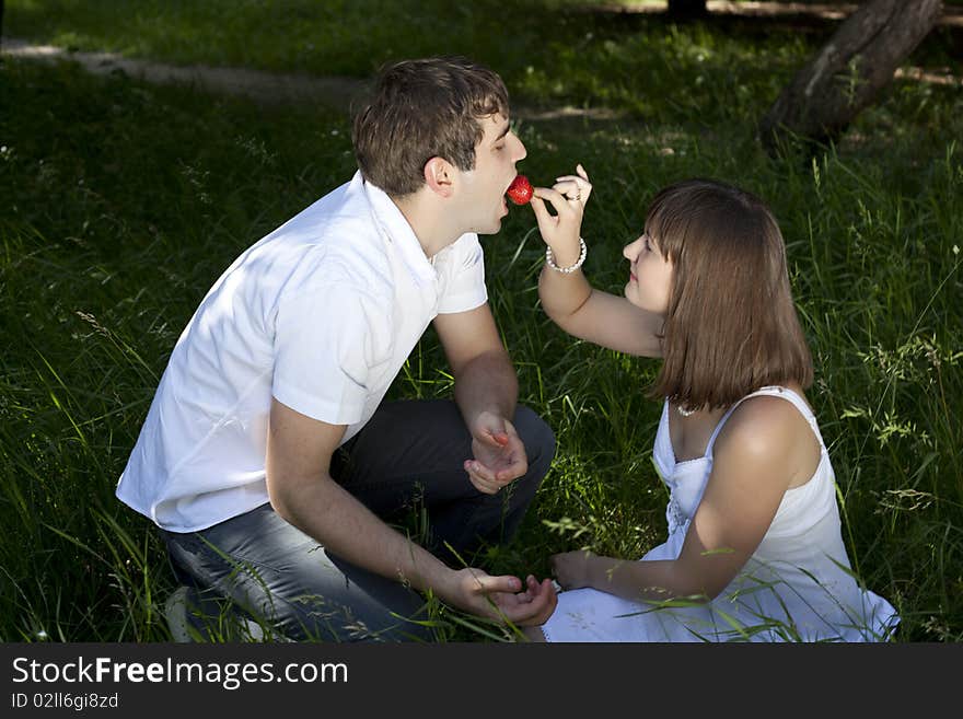 Woman and man posing in the middle of nature. Woman and man posing in the middle of nature