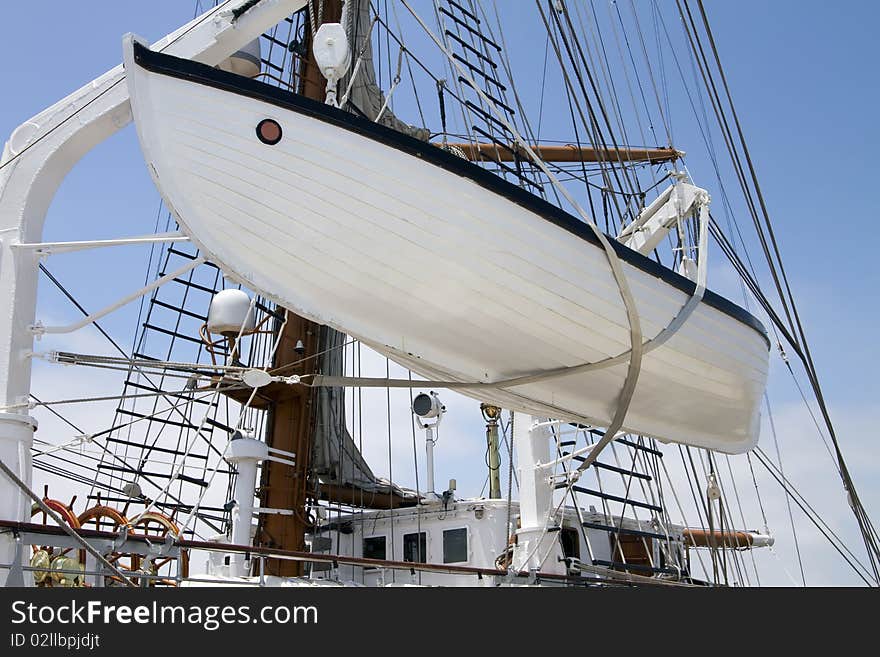 Lifeboat aboard a Portuguese sailing ship in port at San Diego, California, USA. Lifeboat aboard a Portuguese sailing ship in port at San Diego, California, USA