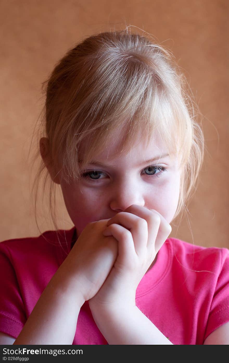 Thoughtful little girl