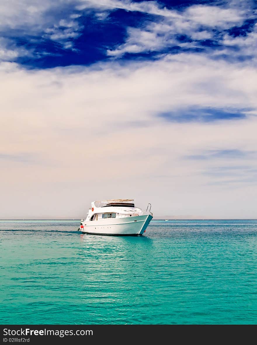 Yacht entering in to the turquoise gulf. Yacht entering in to the turquoise gulf.