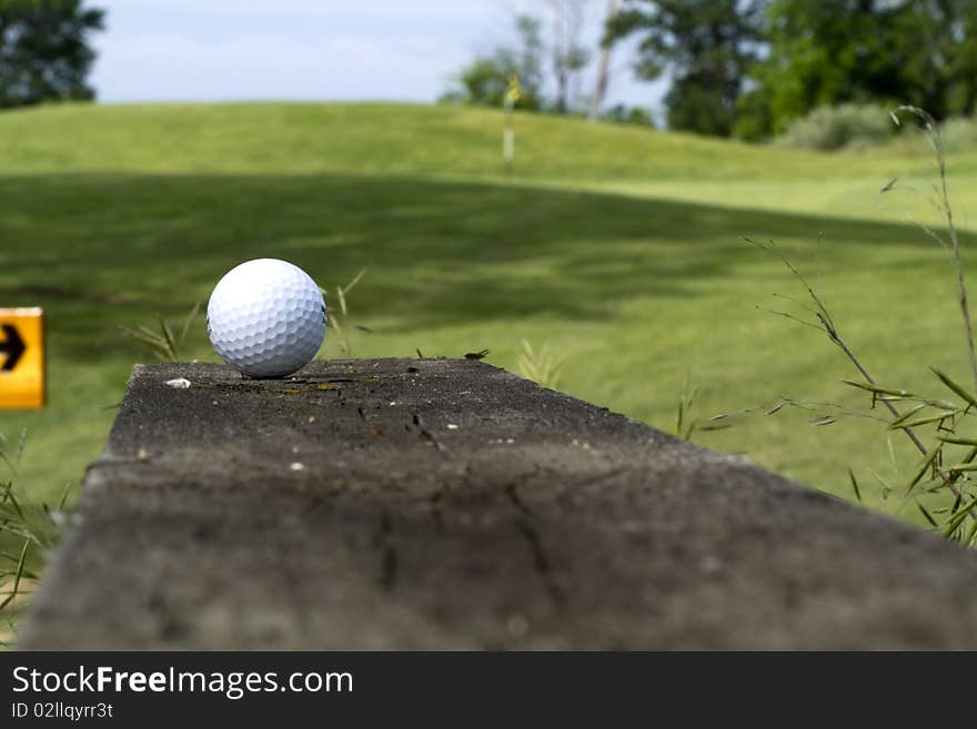 Golfer finds himself in a pickle on the railing. Golfer finds himself in a pickle on the railing