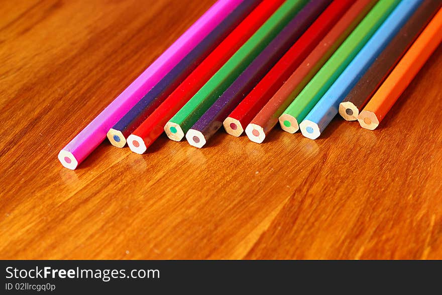 Coloring pencils spread out on a table