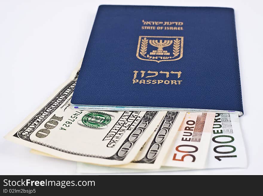 Israeli passport and dollar bills isolated on white with cliping path