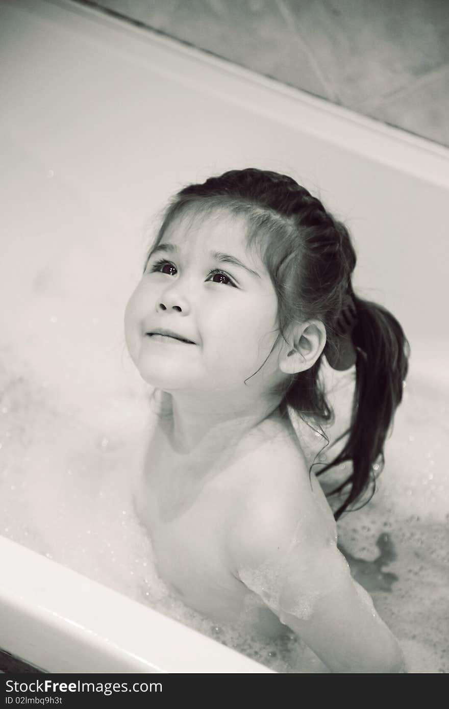 Girl taking bath with bath foam (bw). Girl taking bath with bath foam (bw)