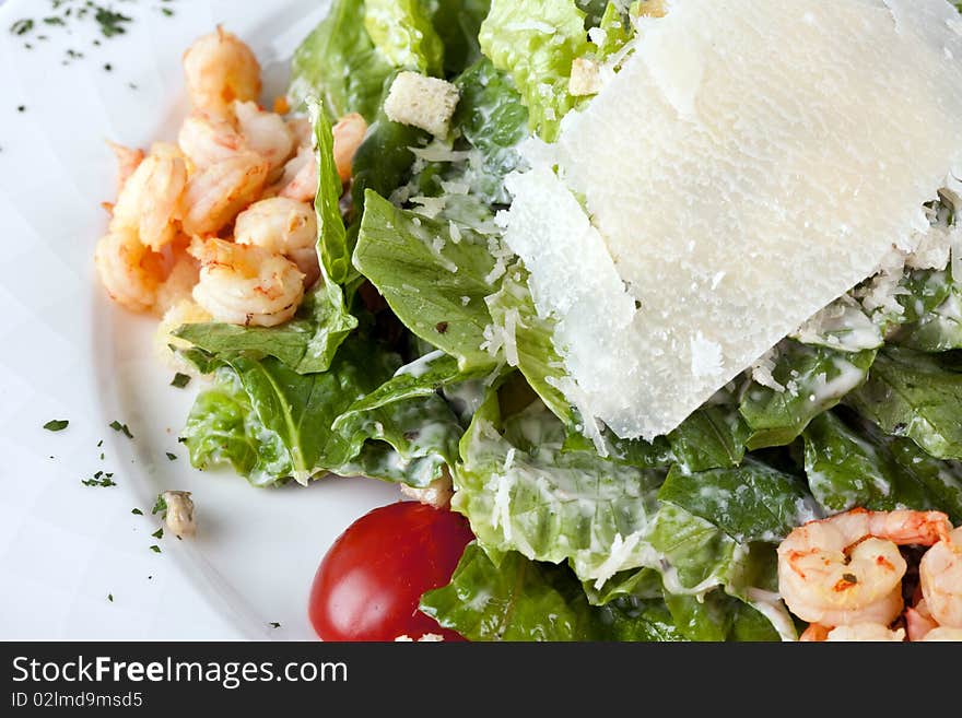 Salad  caesar  with shrimps on plate