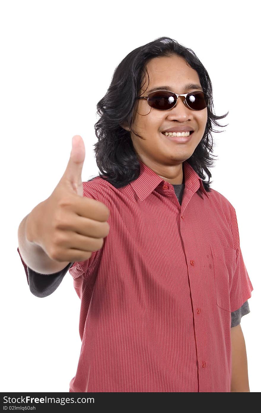 Long hair man with sunglasses give thumb