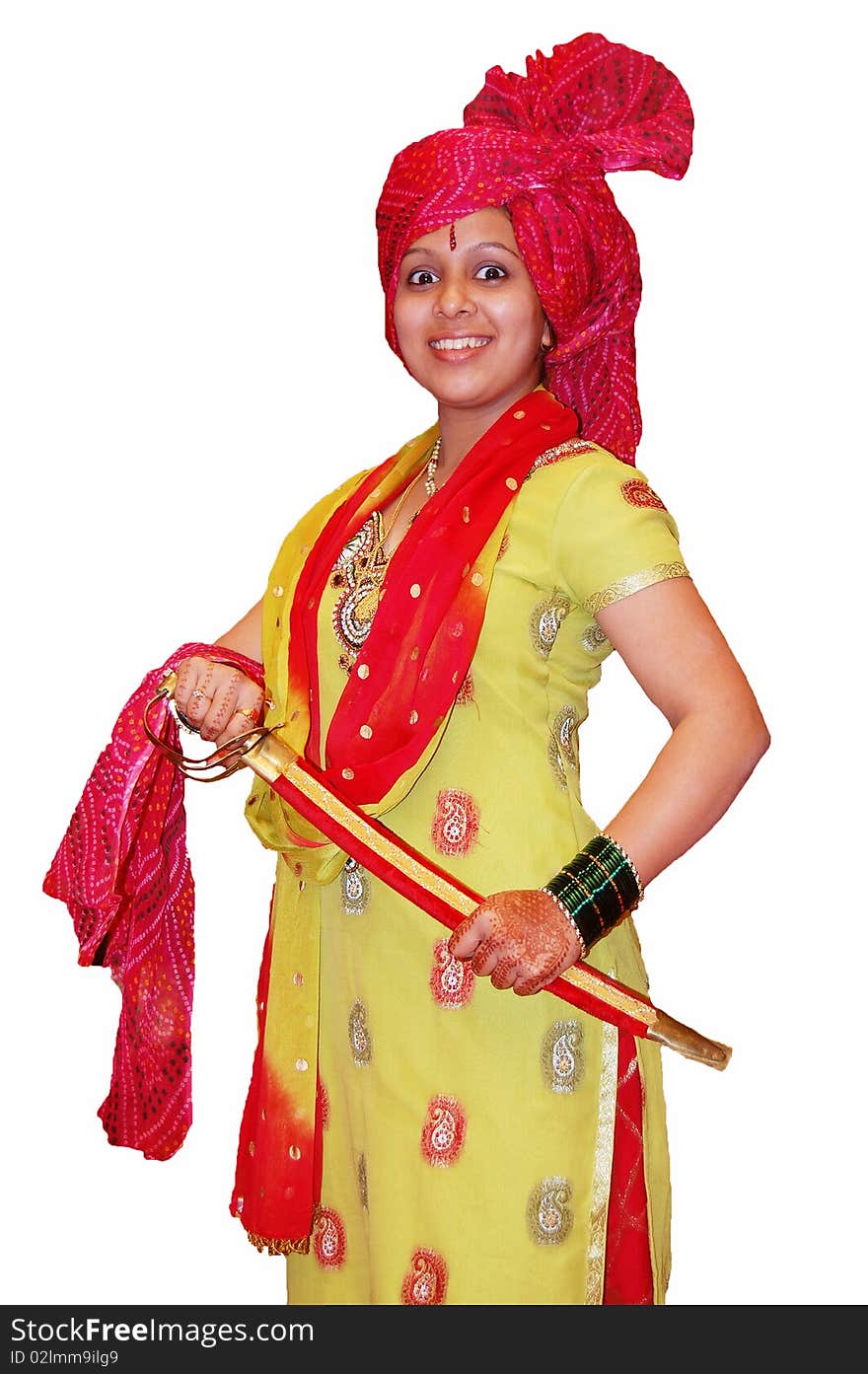 A young Maratha Indian warrior posing with a sword