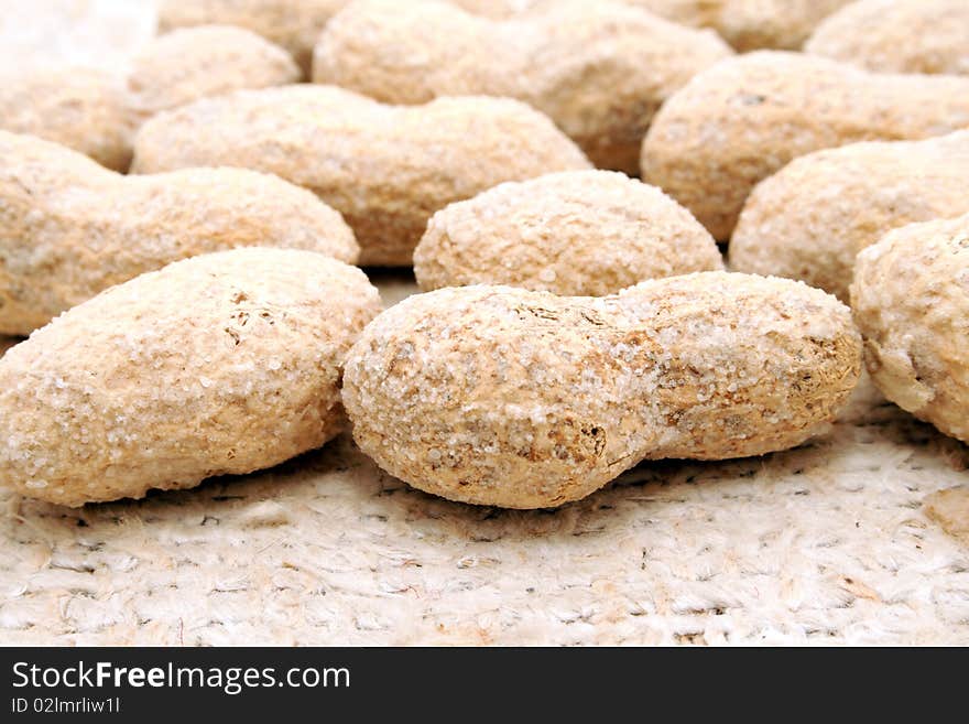 Close up of a bunch of salted peanuts