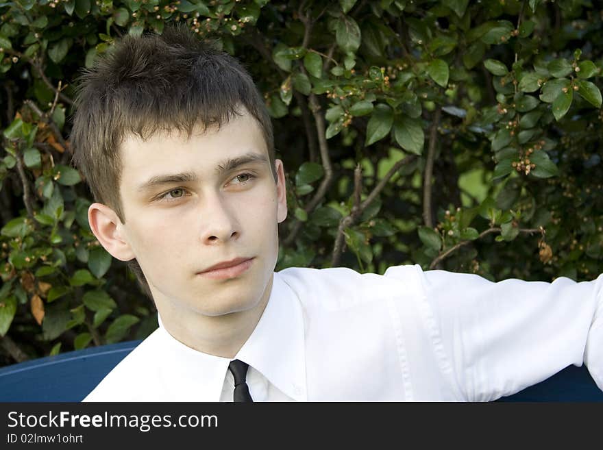 Teenager On Park Bench