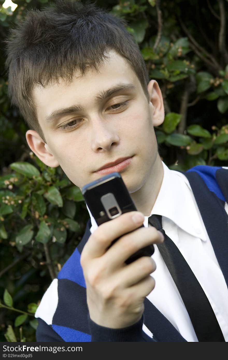 Teenager looking at mobile phone