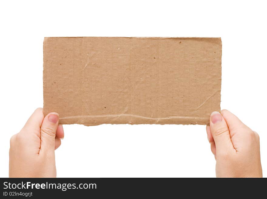 The cardboard tablet in a hand isolated over white