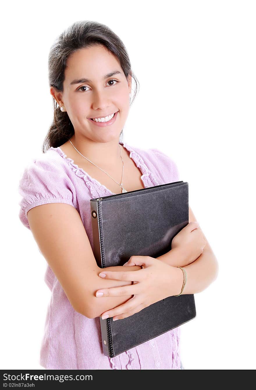 Young student with books in hand looking at the camera. Young student with books in hand looking at the camera