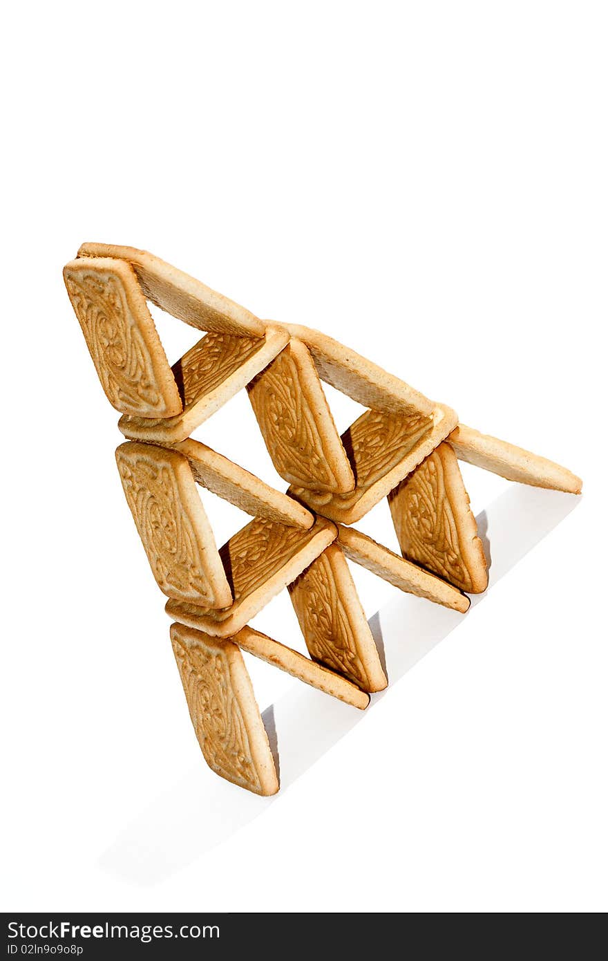 Pyramid from cookies on white background