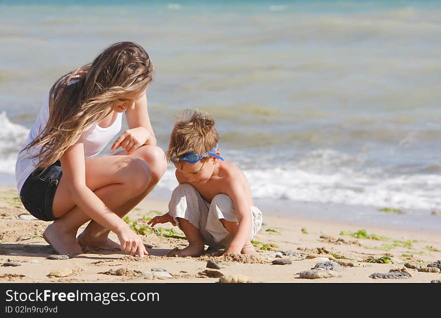 Mother and son on beach