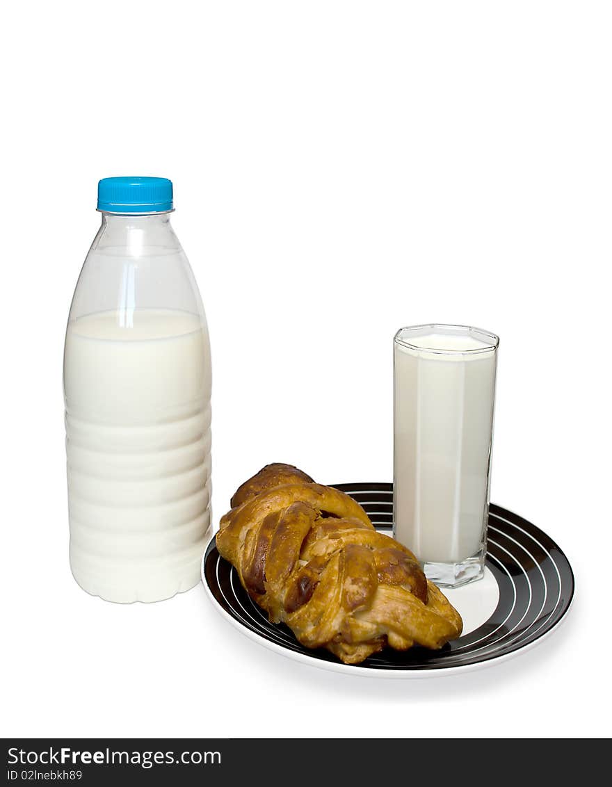 Milk with a roll is on the white background