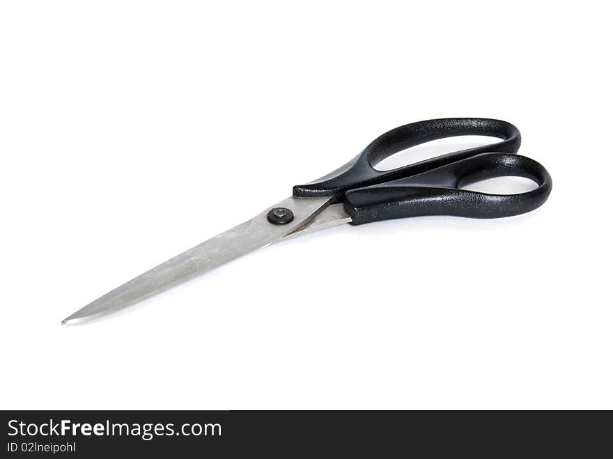 Sewing metal and black plastic scissors cutout on white background. Sewing metal and black plastic scissors cutout on white background