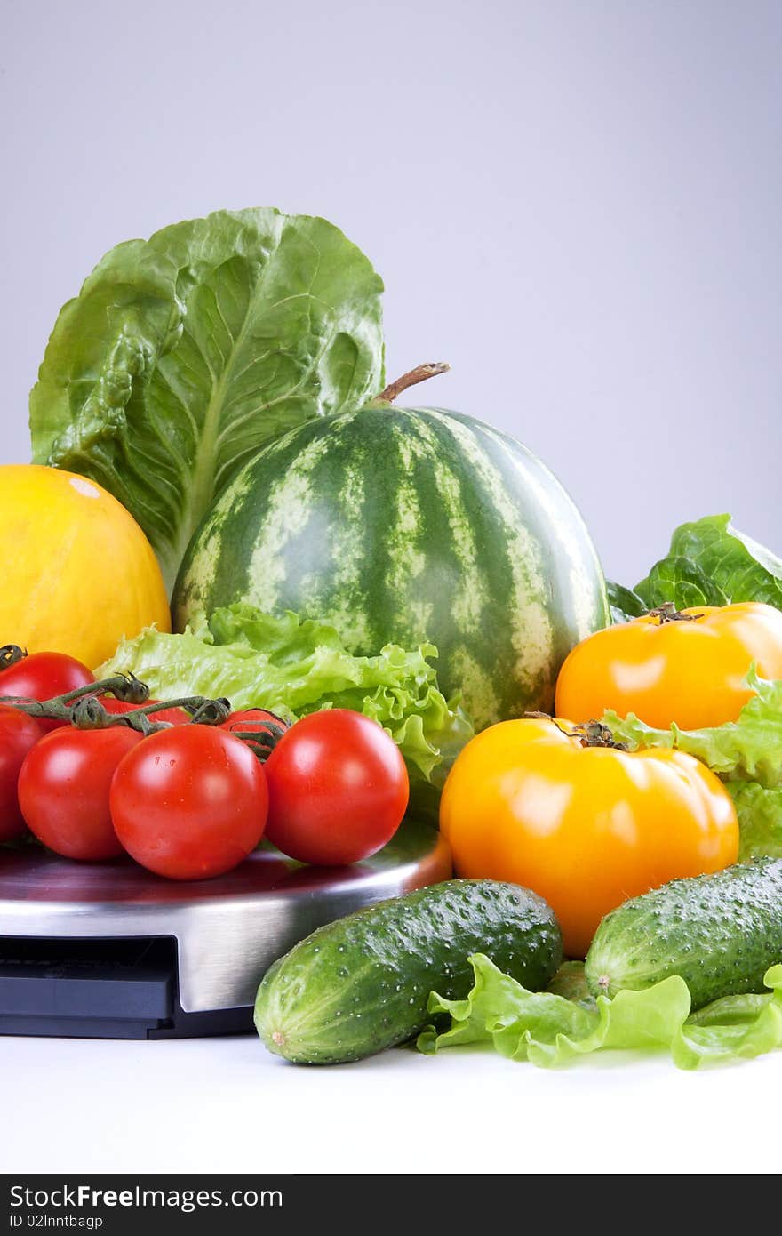 Fresh vegetables on gray background