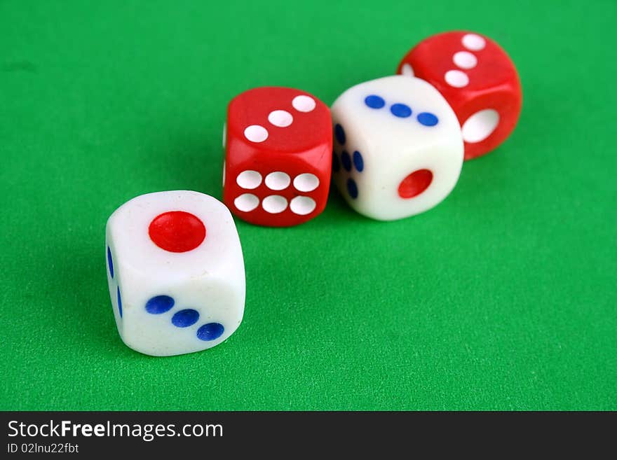 Macro of mahjong dices over pink background