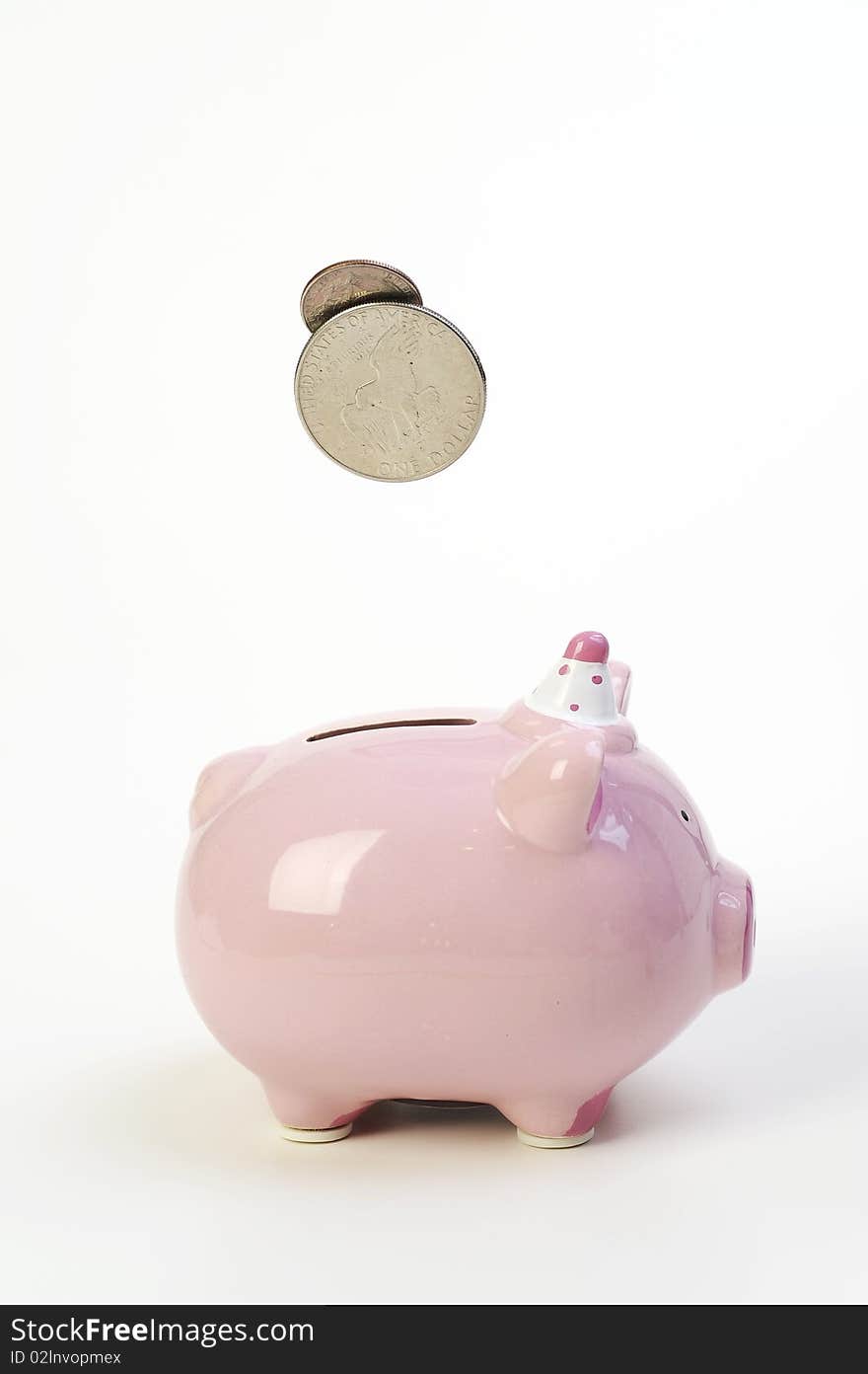 Piggy bank and falling coins