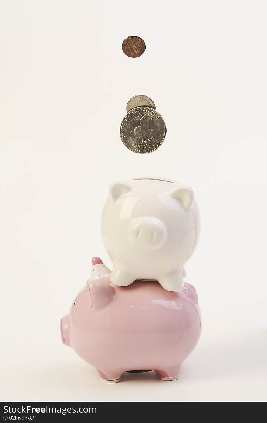 Piggy bank and falling coins