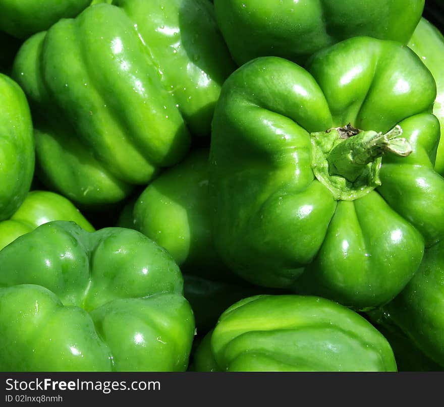 Beautiful bell peppers on display at a farmers market. Beautiful bell peppers on display at a farmers market.