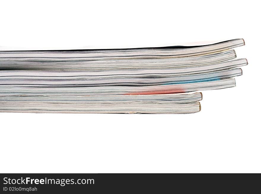 Stack of magazines isolated on a white