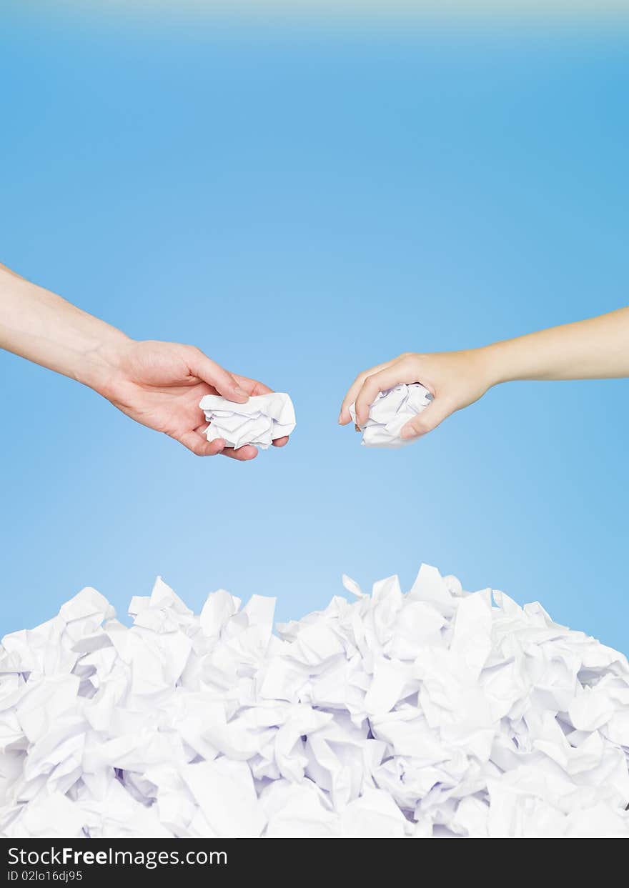 Hands with papers on blue backround