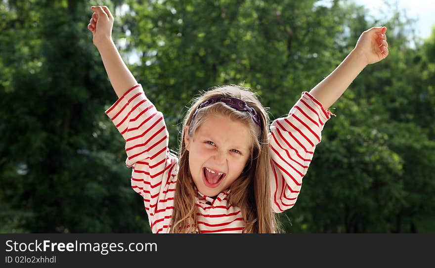 An image of a nice joyful girl outdoors