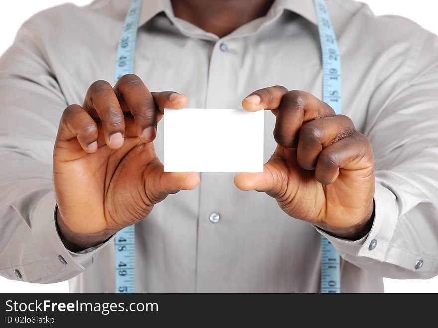 This is an image of a business man wearing a measuring tape and holding a business card. This is an image of a business man wearing a measuring tape and holding a business card.