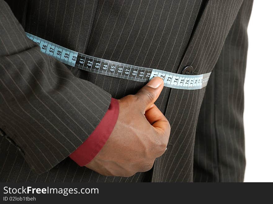 Black business man wearing a measuring tape