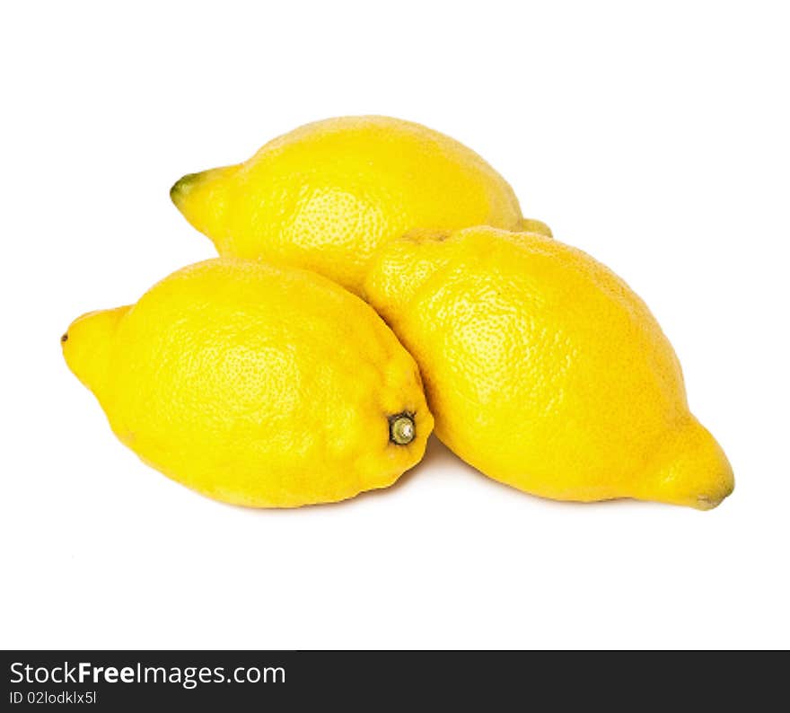 Three large lemons isolated on white. Three large lemons isolated on white.