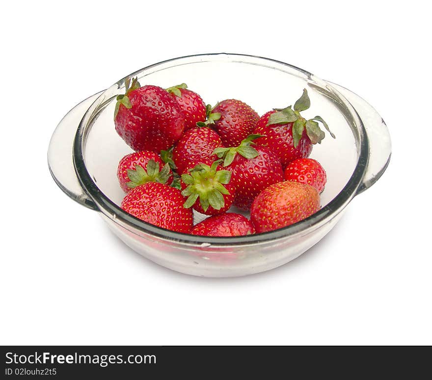 Strawberries in a glass dish.