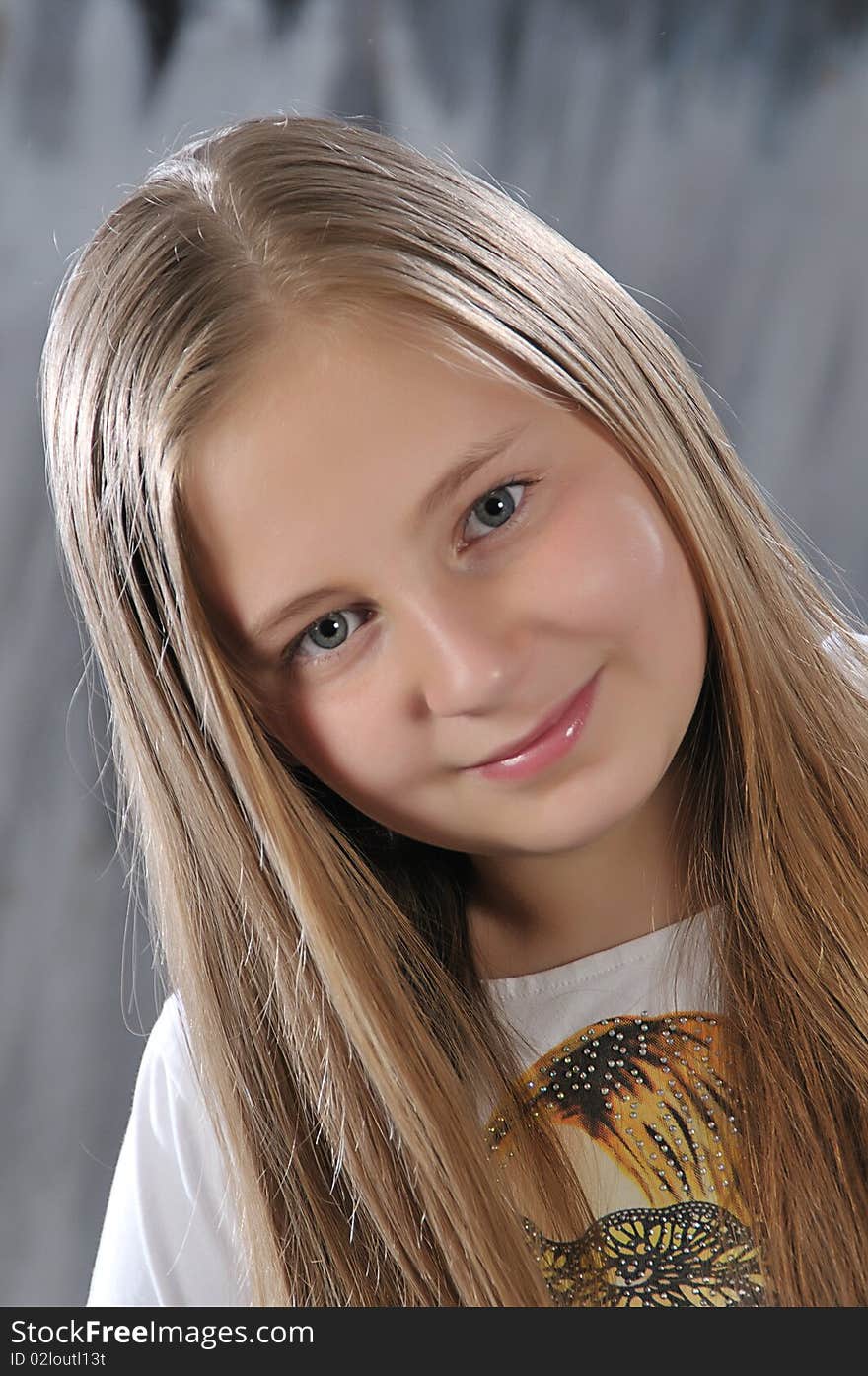 Portrait of long-haired girl in a white hood