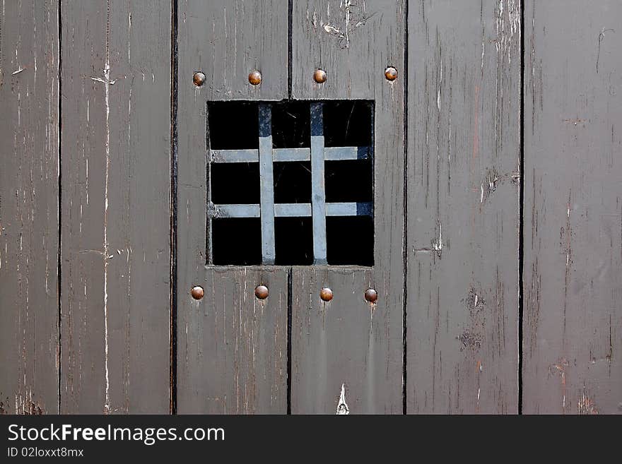 Old window.Wooden wall. House