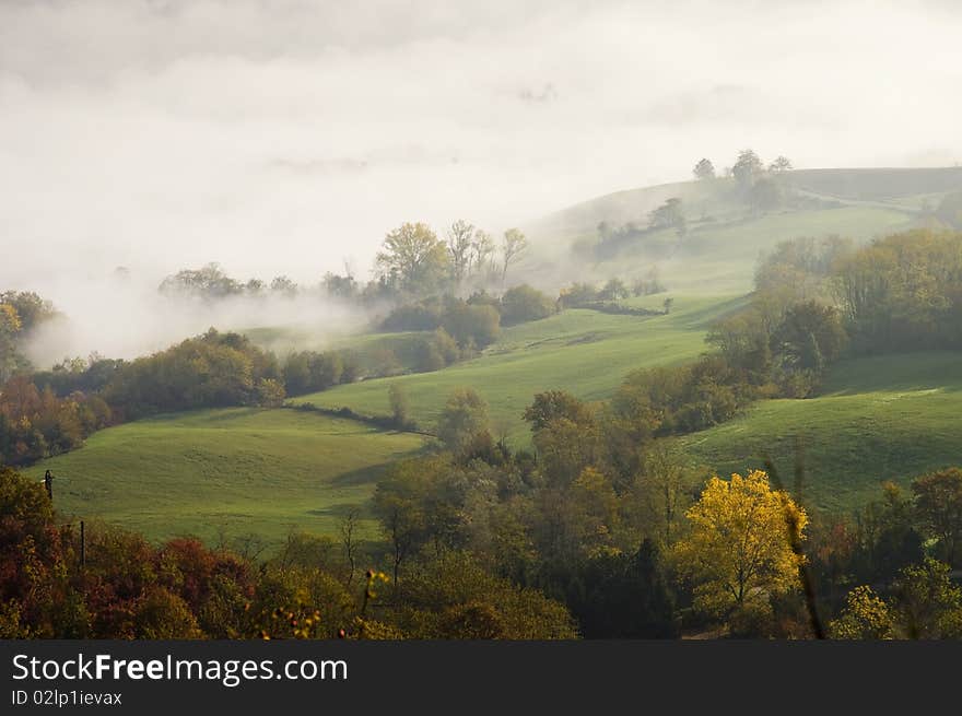 The tops of hills in the clouds