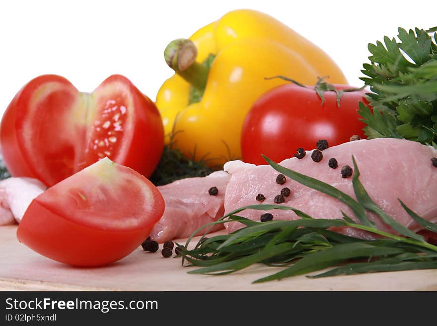 Fresh vegetables and pork isolated on a white background. Fresh vegetables and pork isolated on a white background