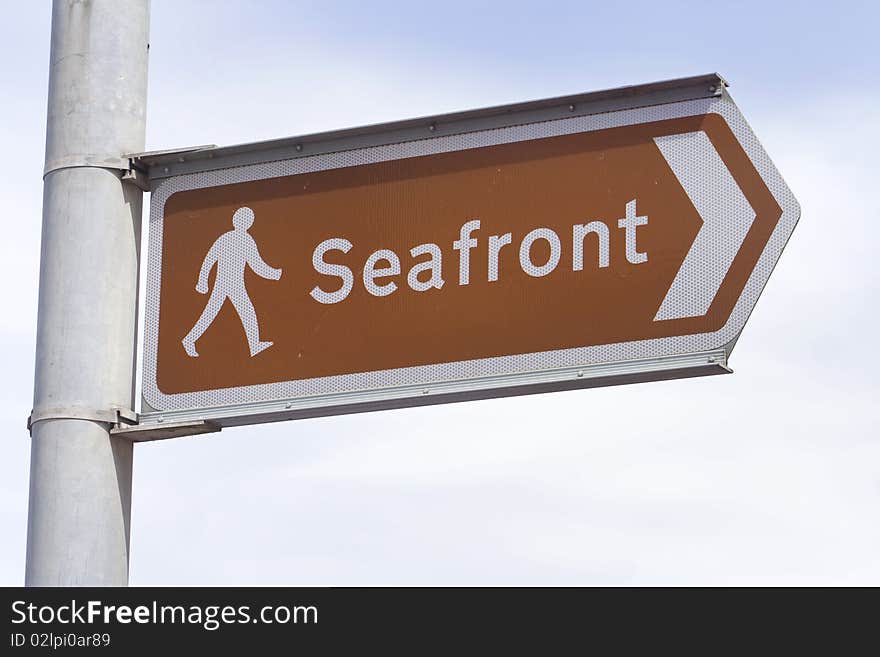 Road sign at English seaside resort showing way to the sea. Road sign at English seaside resort showing way to the sea