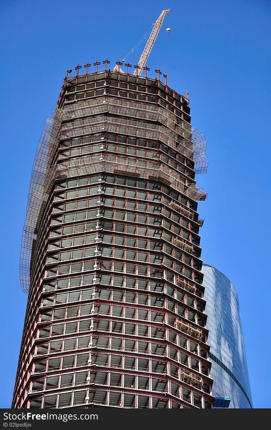 Building of a new building against the sky. Building of a new building against the sky.