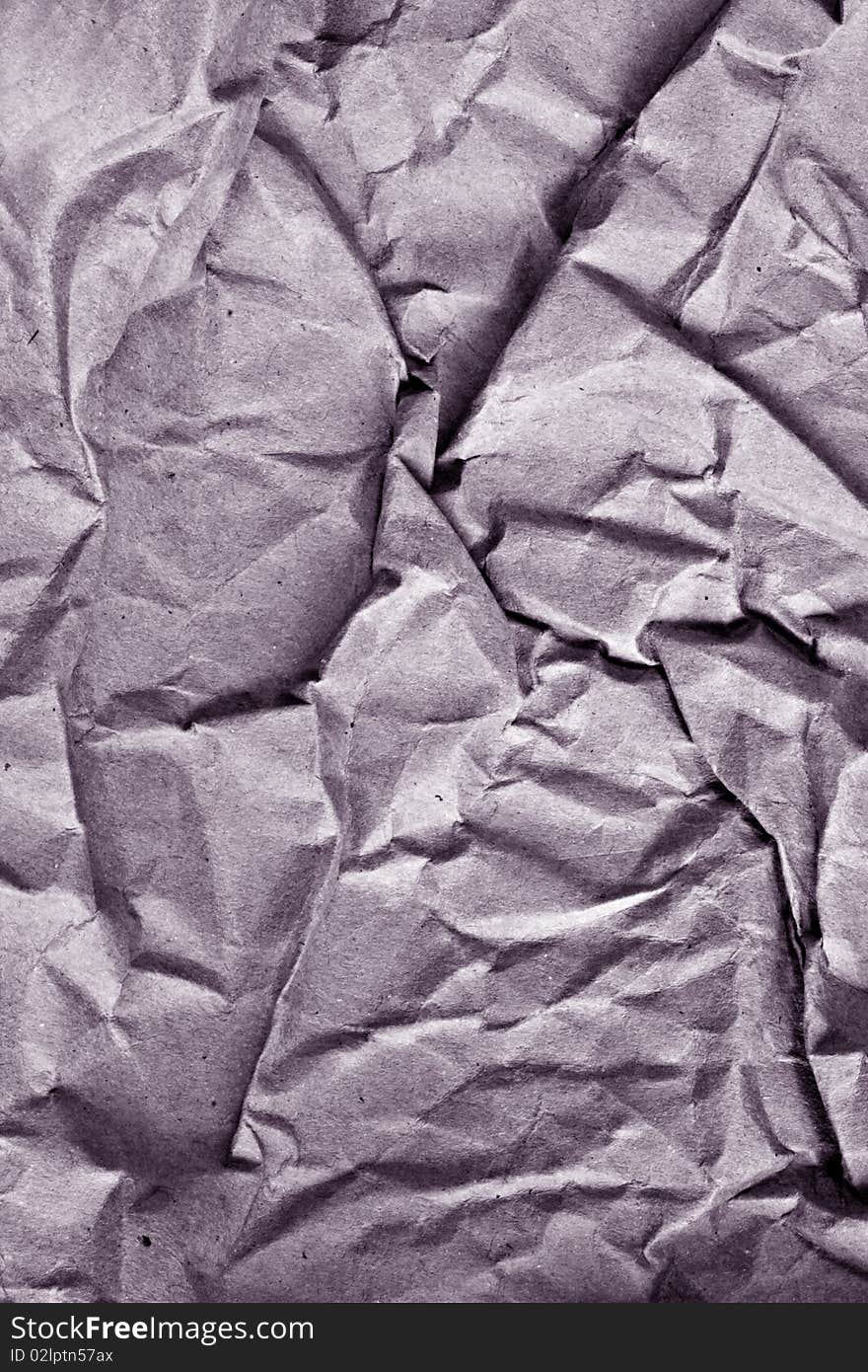 A closeup background of crunched gray paper. A closeup background of crunched gray paper