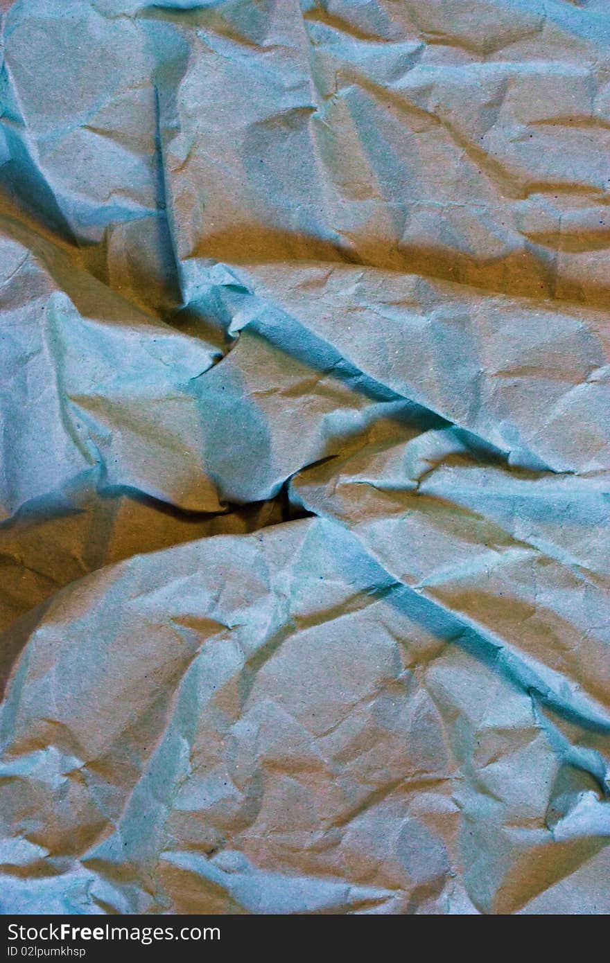 A blue closeup of scrunched up paper  . A blue closeup of scrunched up paper