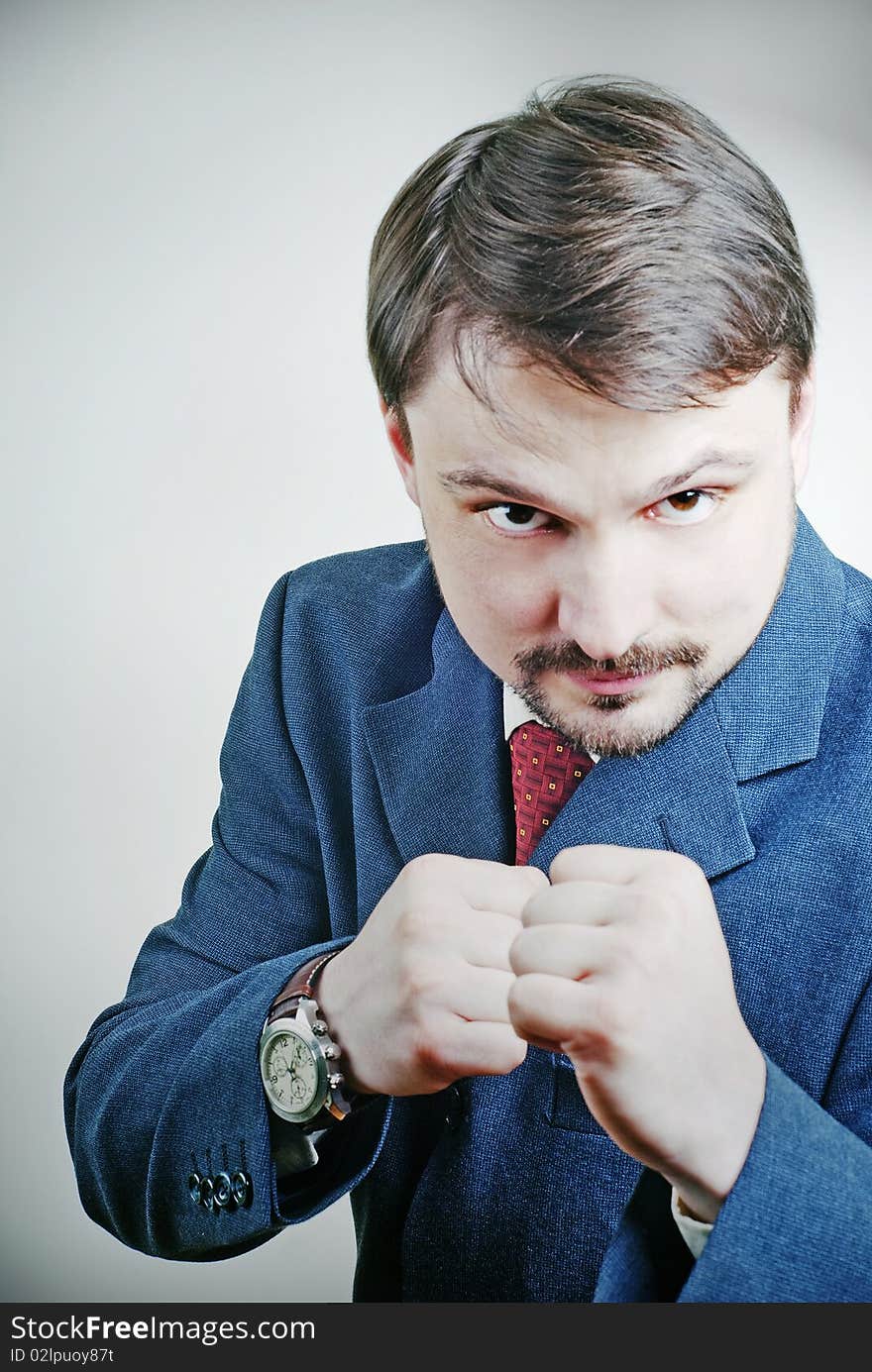 Bearded man with fists