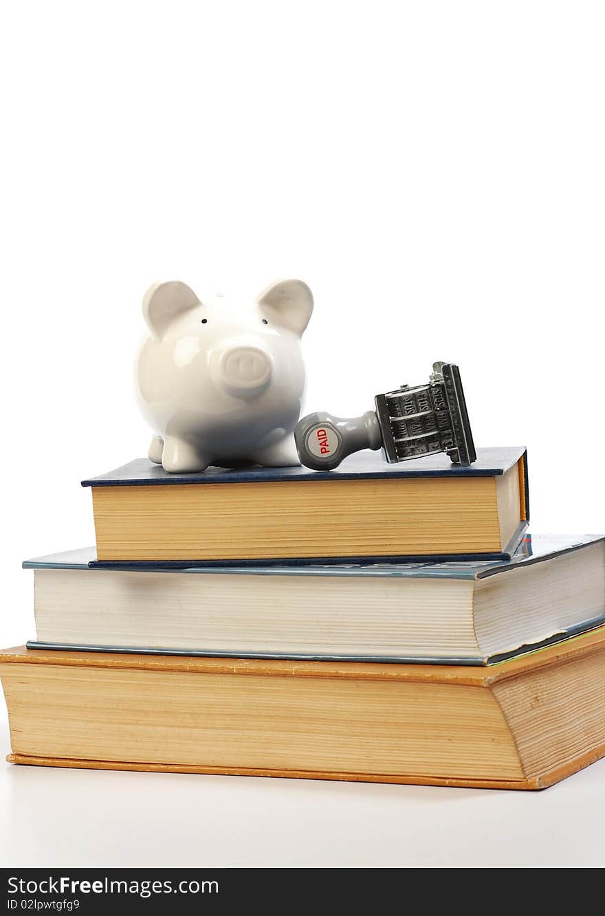 Piggy bank and college books