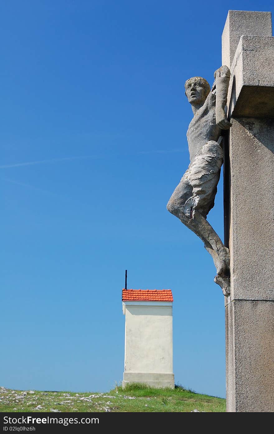 Crucified man with small chapel on top of the calvary in nitra, slovakia