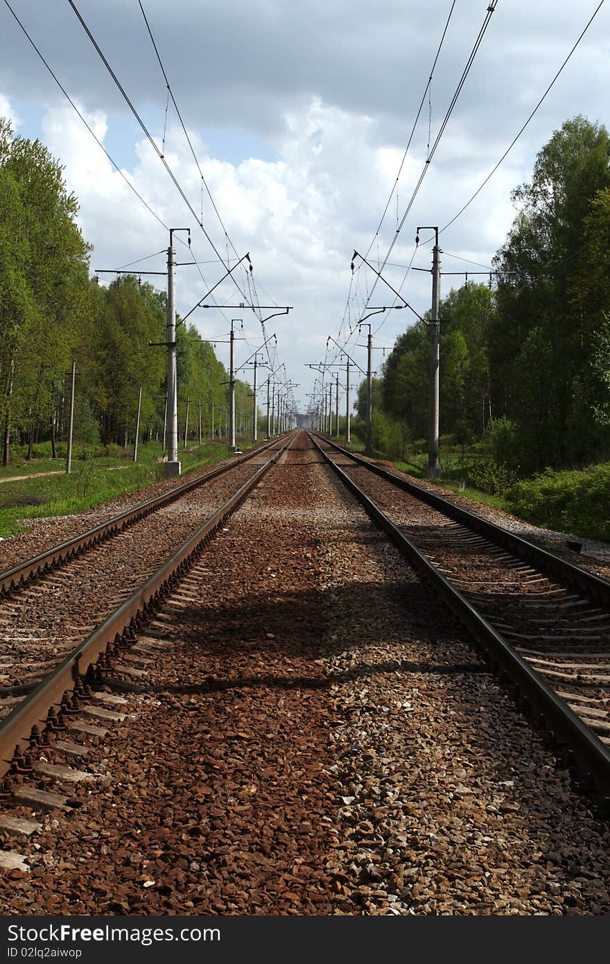 Railwayroad in the forest in summer