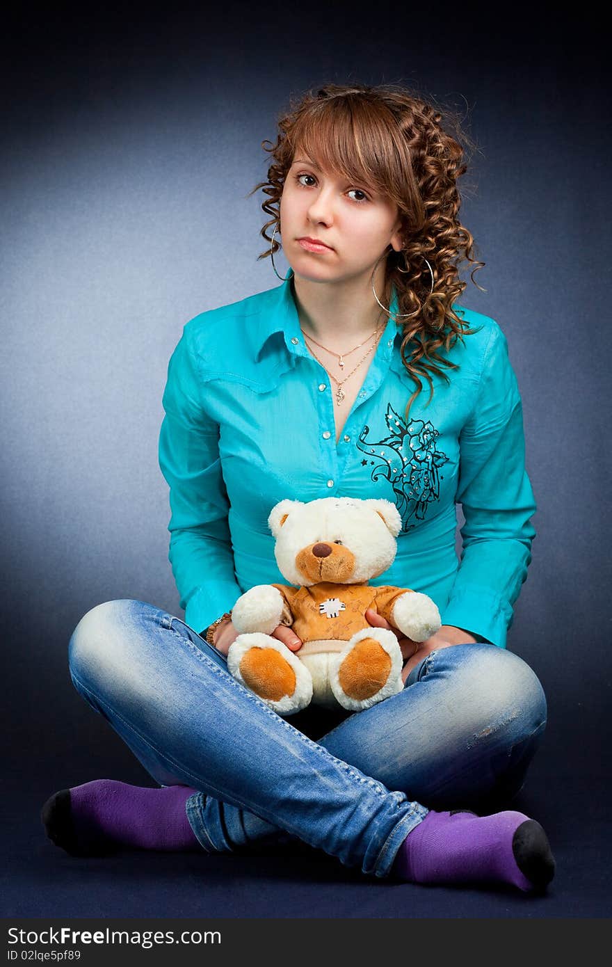 Young teen with teddy